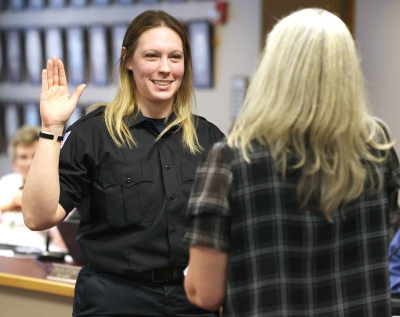 New Sycamore firefighter KeeLey Meyer is officially sworn in by city clerk Mary Kalk Monday, April 1, 2024, during the Sycamore City Council meeting in the chambers at Sycamore Center.