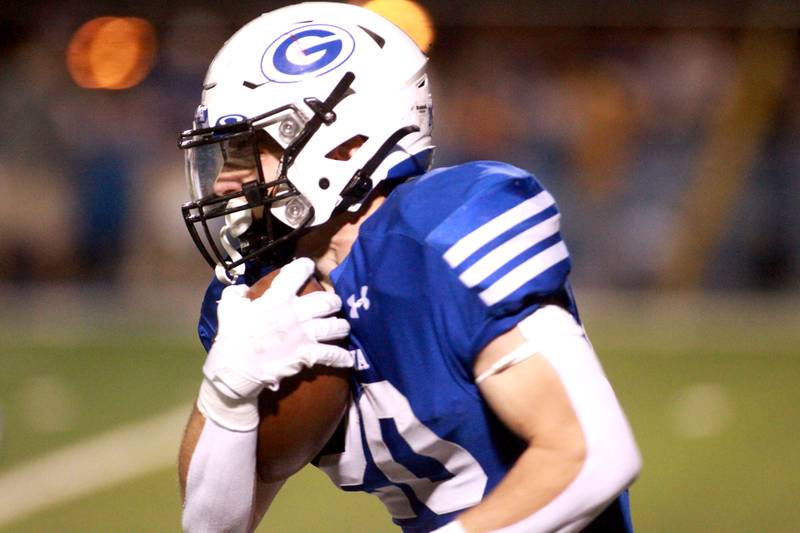 Geneva’s Michael Rumoro runs the ball during a game against Wheaton North on Friday, Oct. 11, 2024 in Geneva.