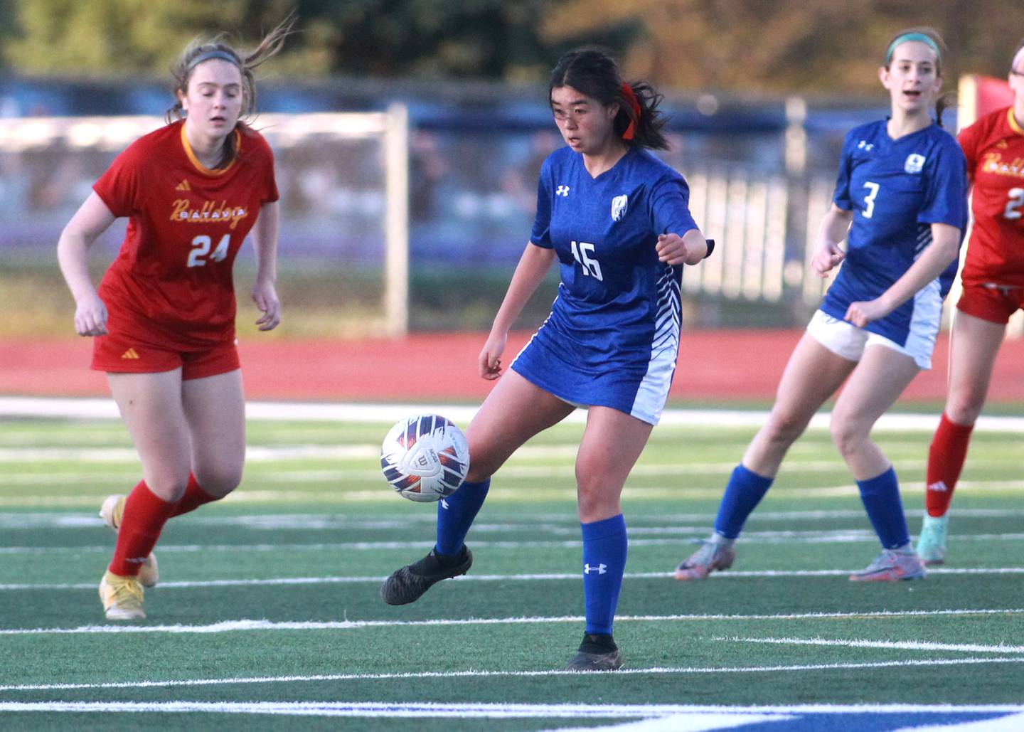 Geneva’s Leyna Yonehara gets control of the ball during a Tri-Cities Night game against Batavia at St. Charles North on Tuesday, April 23, 2024.