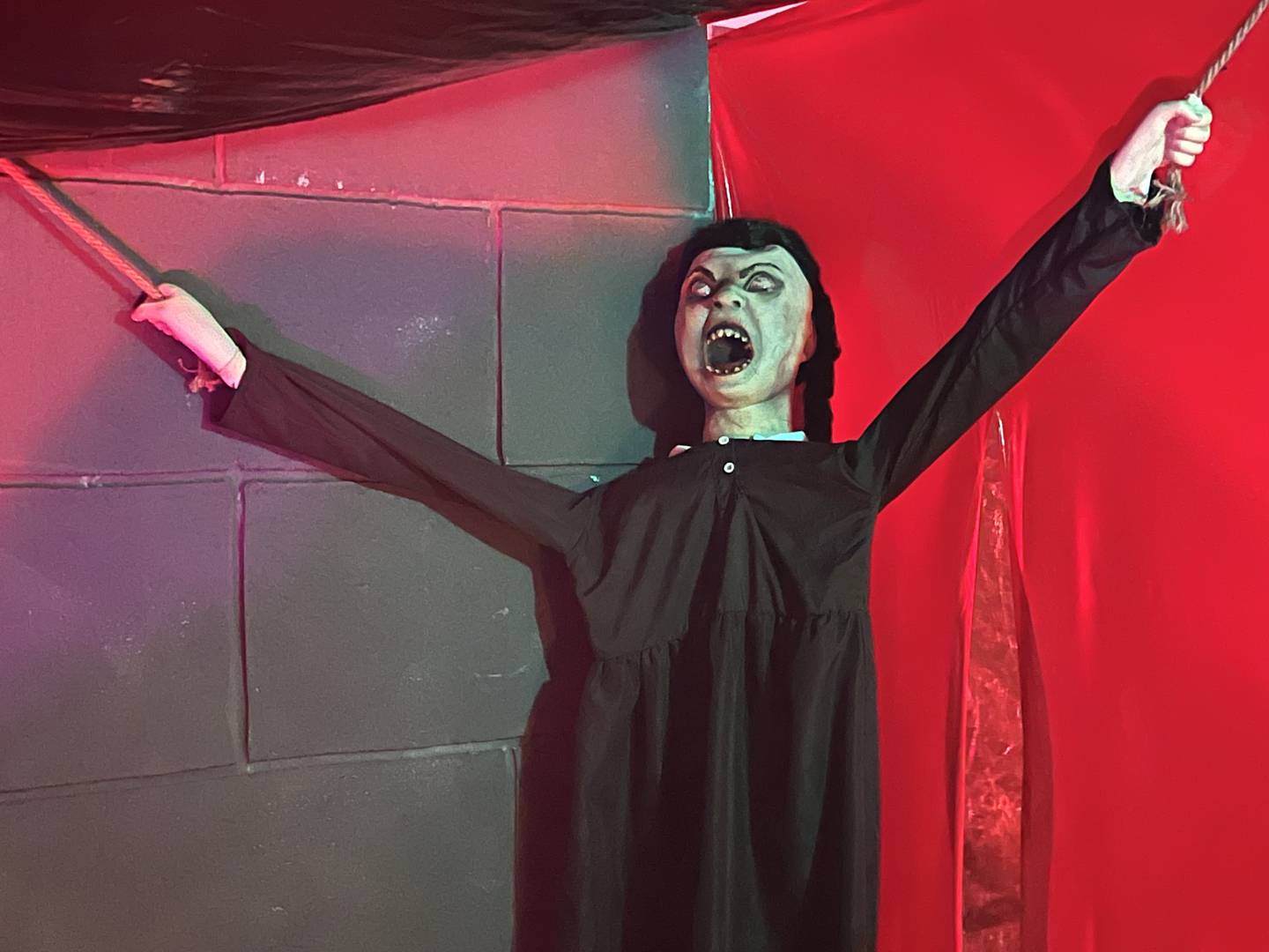 A mannequin hangs on the wall inside Blood on Borden, the family-run haunted attraction inside a Sycamore home.