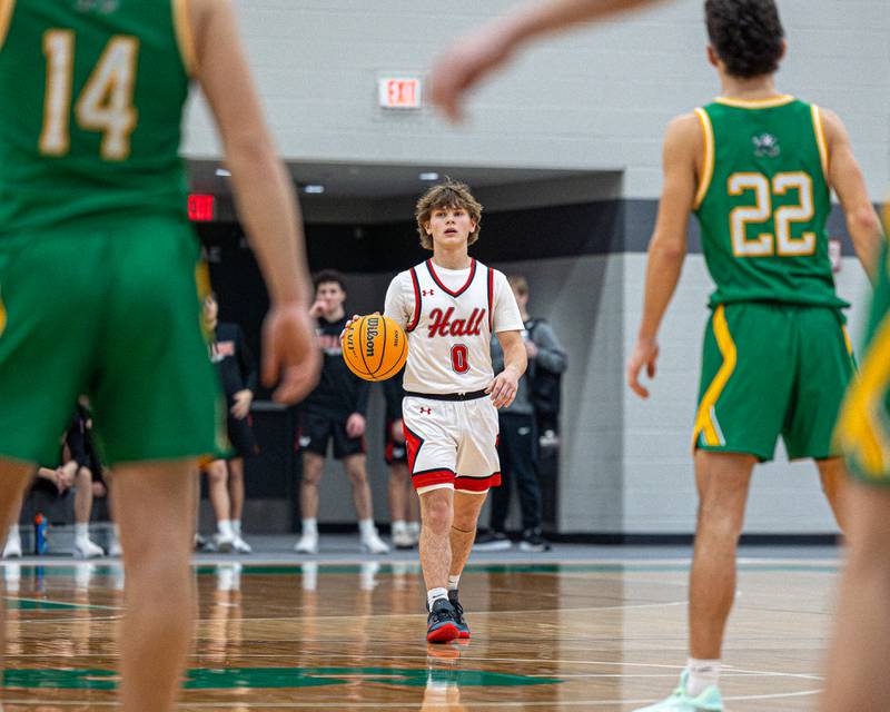 Greyson Bickett (0) of Hall dribbles ball up court during game in the Shipyard Showdown on Tuesday, December 23, 2025 at Seneca High School in Seneca.