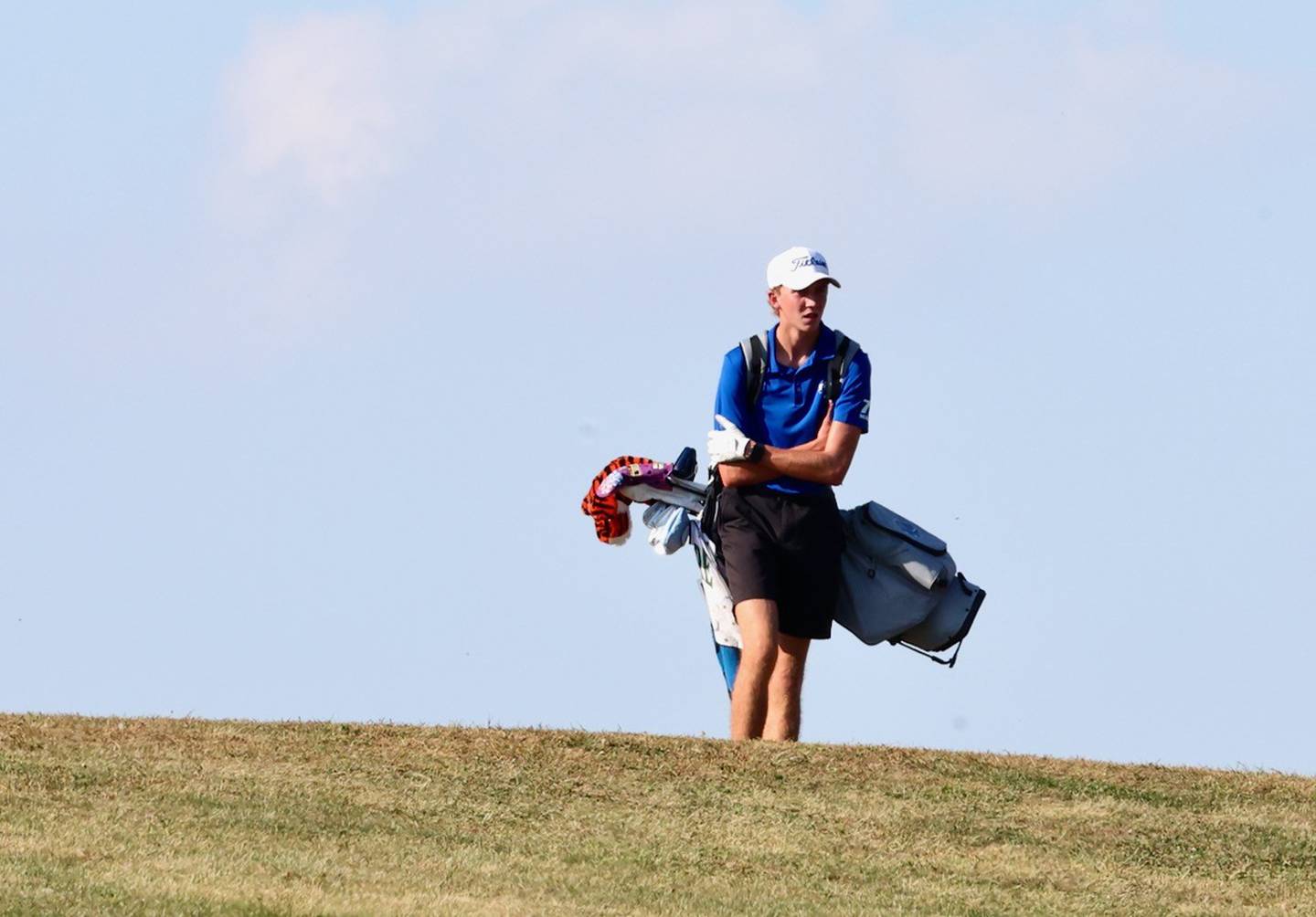 Princeton senior Jackson Mason climbs the hill at Chapel Hill Golf Course on Thursday.