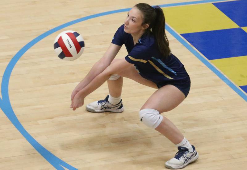 Marquette's libero Hailey Abbott returns a serve from Newark on Wednesday, Aug. 27, 2025 in Bader Gymnasium.