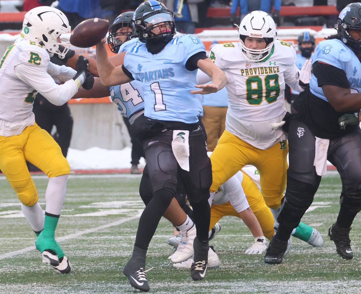 St. Francis quarterback Brock Phillip throws a pass against Providence Catholic during the Class 5A State championship on Tuesday, Dec. 2, 2025 in Hancock Stadium at Illinois State University in Normal.