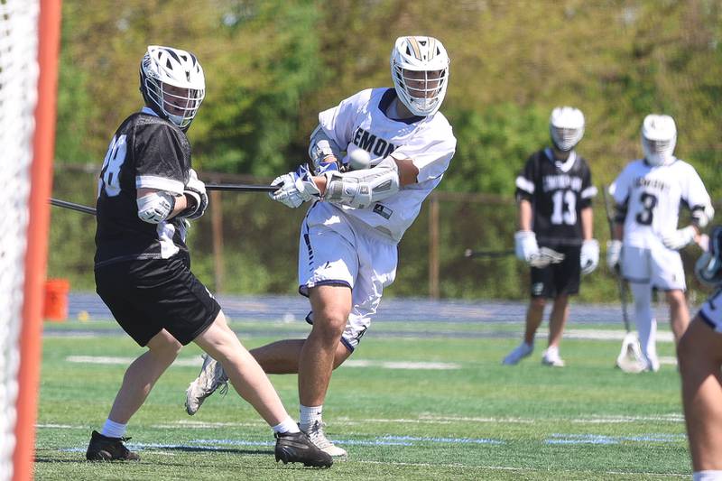 Lemont’s Andrew Tyszkiewicz takes a shot against Lincoln-Way on Saturday, April 25, 2026 in Lemont.