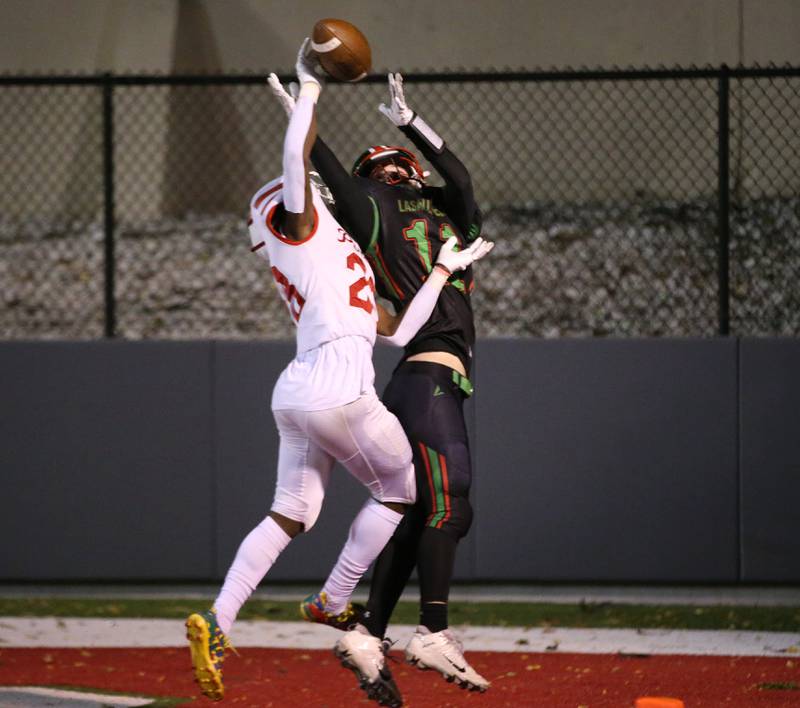 Ottawa's Tristan Finley breaks up a pass intended for La Salle-Peru's Kaleb Kennedy on Friday, Oct. 6, 2023, at Howard Fellows Stadium.