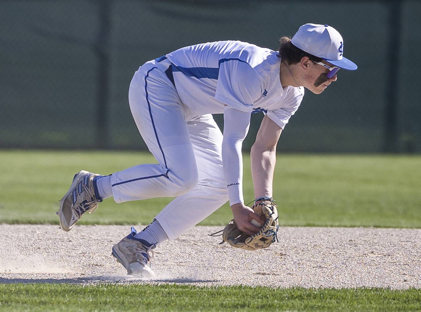 Newman’s Garet Matznick starts a 6-4-3 double play against Hall Monday, April 15, 2024 at Newman High School.