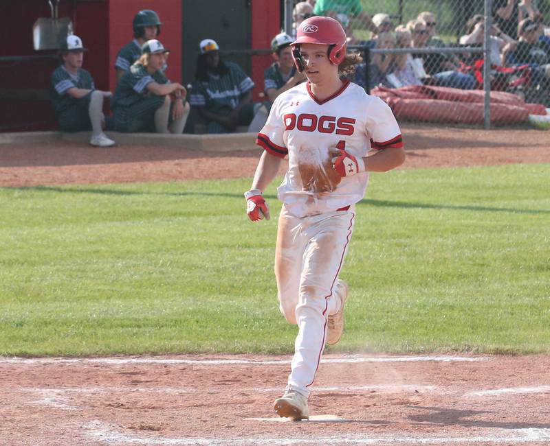 Streator's Noah Camp crosses home plate to score a run against Richwoods during the Class 3A Sectional semifinal game on Wednesday, May 31, 2023 at Metamora High School.