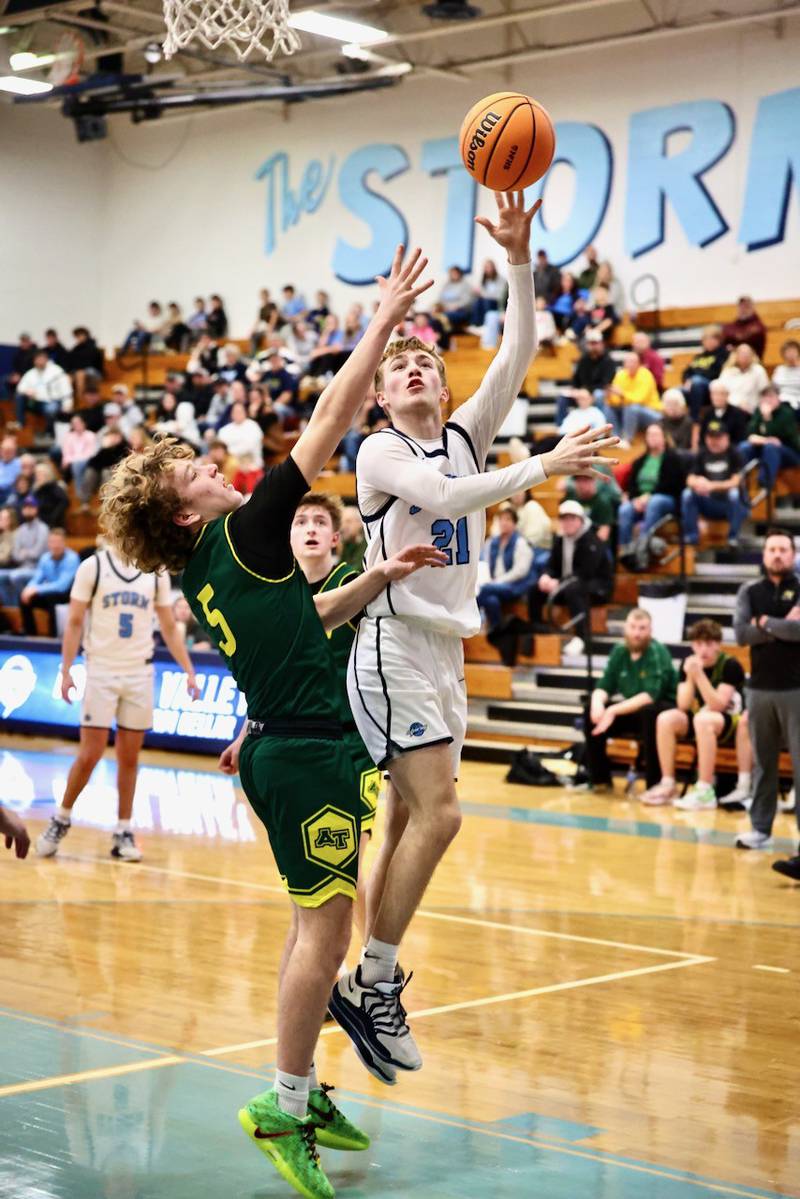 Bureau Valley's Zac Wiggim shoots over Abingdon-Avon's Ryker Darst for the game-tying basket Friday night at the Storm Cellar. A-Town won 47-45.