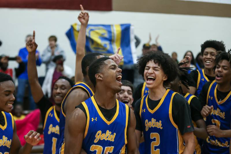 Joliet Central celebrates the win over Romeoville for the WJOL Tournament Championship. Nov 25, 2023.