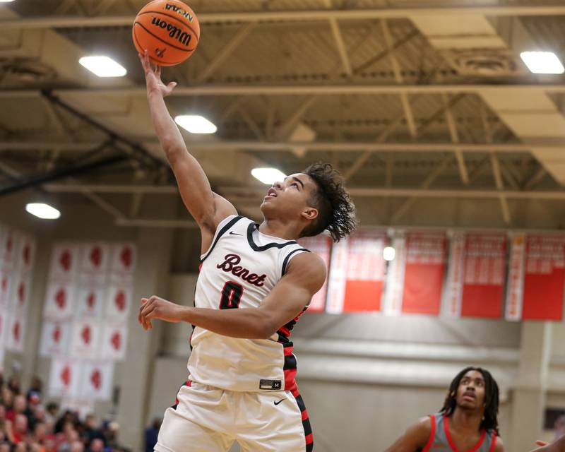 Benet's Blake Fagbemi (0) goes in for a layup during their When Sides Collide Shootout basketball tournament matchup between Rich Township at Benet Academy. Jan 25, 2025 in Lisle.