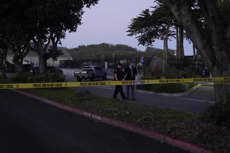 Police tape is placed near the scene of a shooting Monday, Jan. 23, 2023, in Half Moon Bay, Calif. Multiple people were killed in two related shootings Monday at a mushroom farm and a trucking firm in a coastal community south of San Francisco, and officials say a suspect is in custody. (AP Photo/Jeff Chiu)