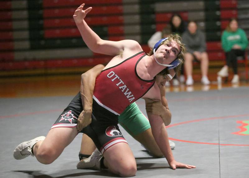 L-P's Noah Wroblewski wrestles Ottawa's Owen Kearfott on Thursday, Jan. 9, 2025 in Sellett Gymnasium at L-P High School.