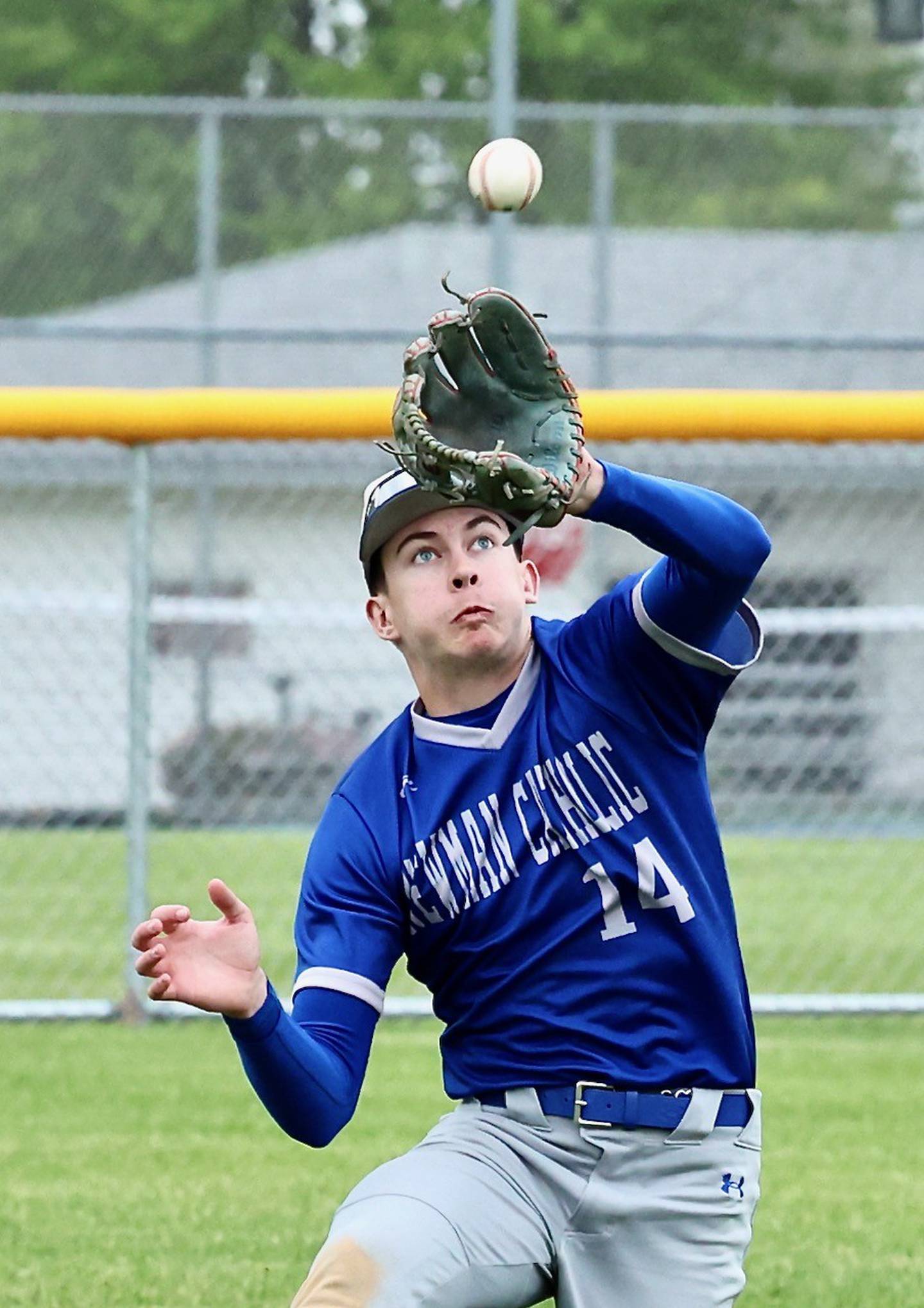 Newman left fielder Jameson Hanlon makes the catch Tuesday at Prather Field in Princeton. The Comets won 9-1.