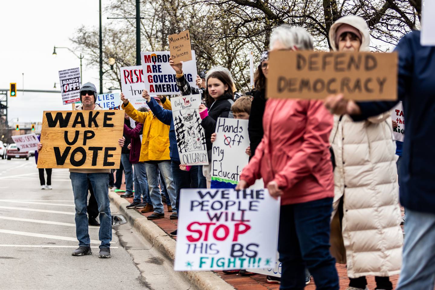 Attendees line Jefferson Street in downtown Joliet during the Hands Off protest on April 5, 2025. The rally was part of a nationwide movement on Saturday to protest policies and actions of the Trump administration and Elon Musk.