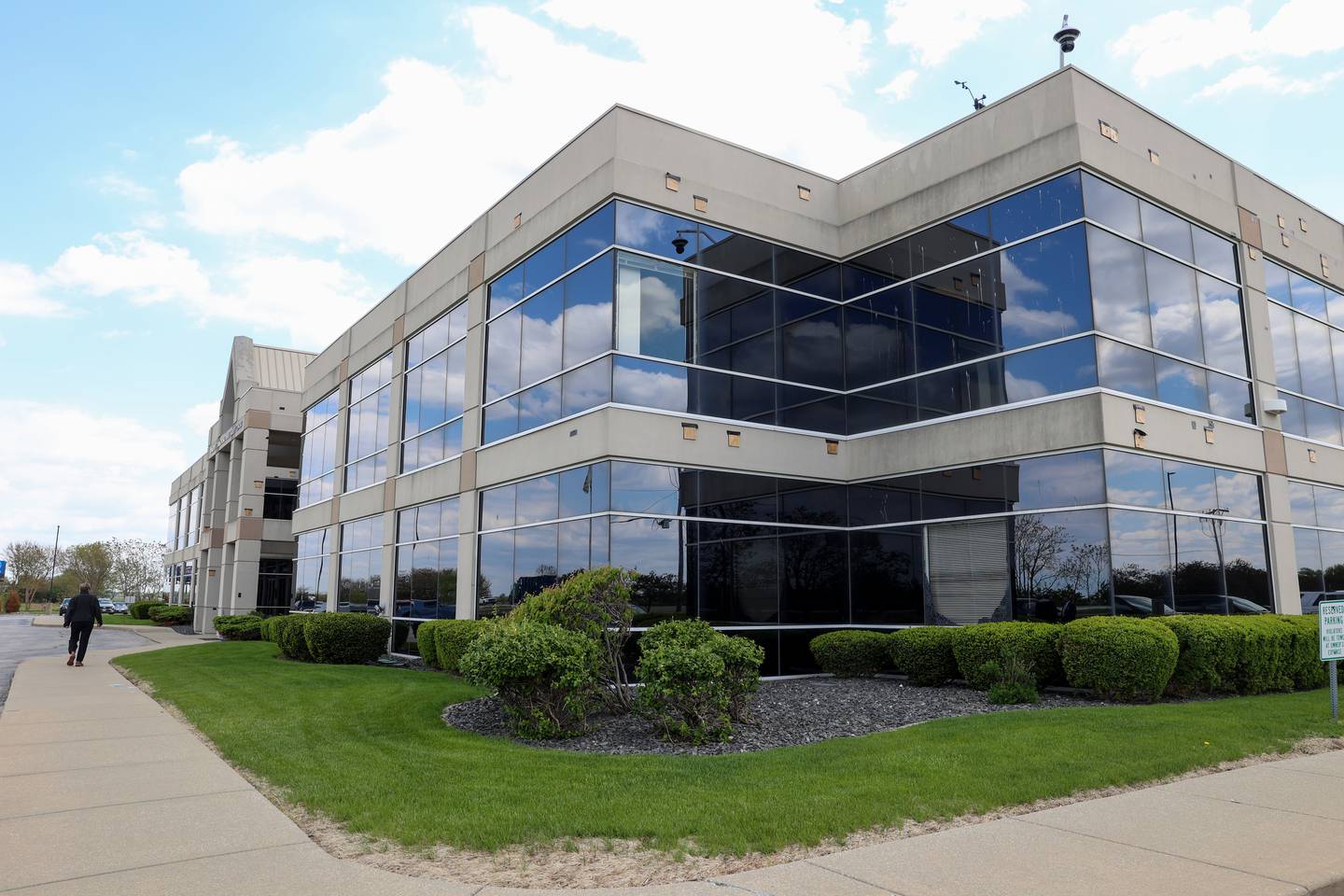Damage to the facade and a window is seen at the Kankakee County Sheriff's Office on April 30, 2026, following the March 10 tornado that passed about 100 yards from the complex.