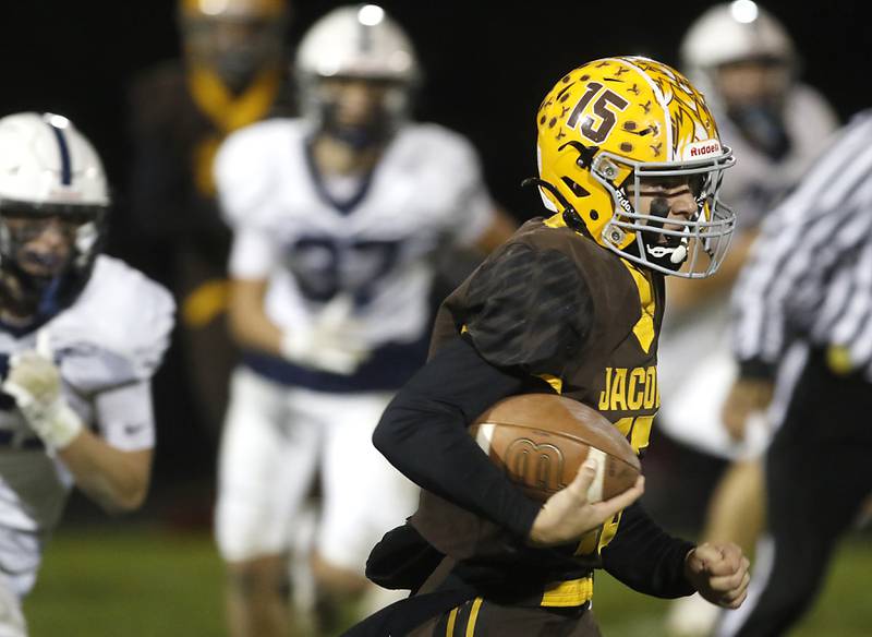 Jacobs' Austin Stennett runs the ball against Cary-Grove during a Fox Valley Conference football game on Friday, Oct. 24, 2025, at Jacobs High School in Algonquin.