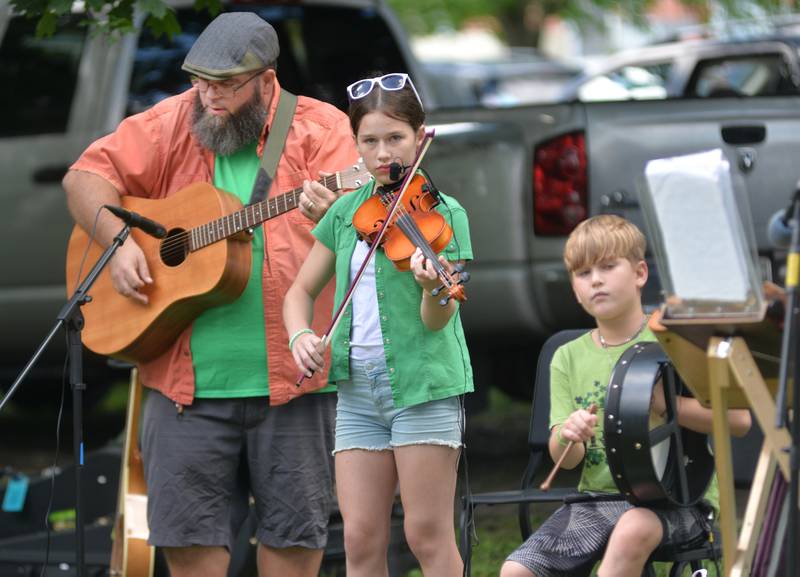 The West Family of Mt. Morris provided some of the afternoon music at Strawfest on Saturday, Aug. 23, 2025 on the Campus square in downtown Mt. Morris.