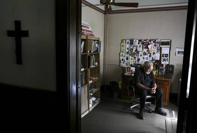 The Rev. Raymond Lescher is seen at his home June 7 in Joliet. Lescher left the priesthood in 1975 after meeting his future wife, Anne, who had 10 children from a previous marriage. After Anne's death, Lescher came back to the priesthood in 1998 and raised his 13-year-old granddaughter in the rectory of Sacred Heart in Joliet.