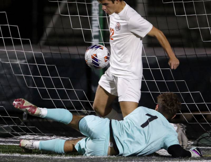 Crystal Lake Central's Justin Moore tries to keep the ball out of the goal in front of his teammate, goalkeeper Anthony Bellino, during the IHSA Boys Soccer 2A Grayslake Central Sectional semifinal match on Tuesday, Oct. 29, 2024, at Grayslake Central High School. It was ruled a goal and credited to Prairie Ridge's Seth Matson.