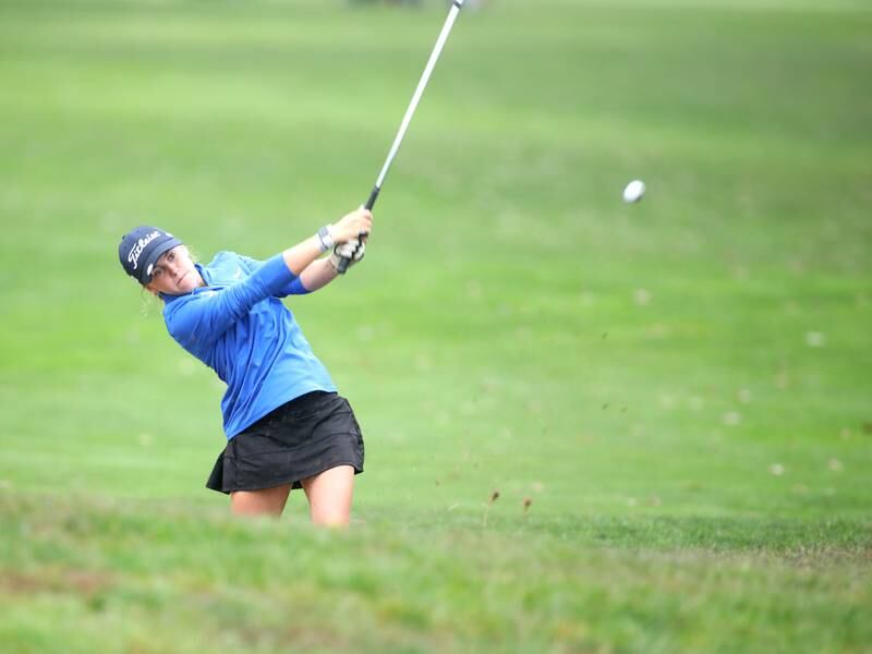 Geneva’s Paige Flanigan hits out of a sand trap during the DuKane Conference Girls Golf Championship on Tuesday, Sept. 24, 2024 at Phillips Park Golf Course in Aurora.