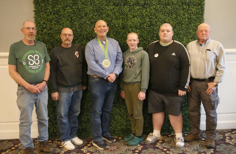 Waltham Scouts (from left) Bruce Brown, Randall Klinek, Brad Bruins, James Lowery, John Boile and Ralph Moshage pose for a photo after getting their heads shaved during the 18th annual Illinois Valley Emergency Services St. Baldrick's event on Sunday, March 23, 2025 at Senicas Oak Ridge in La Salle.