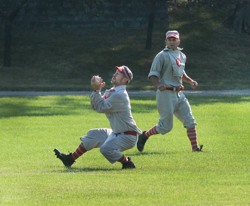 Oregon Ganymede right fielder Eric Berg catches a fly ball as centerfielder Mike Benesh backs up the play at the World Tournament of Historic Base Ball  held at the Henry Ford Museum's Greenfield Village on Sunday, Aug. 10, 2025.