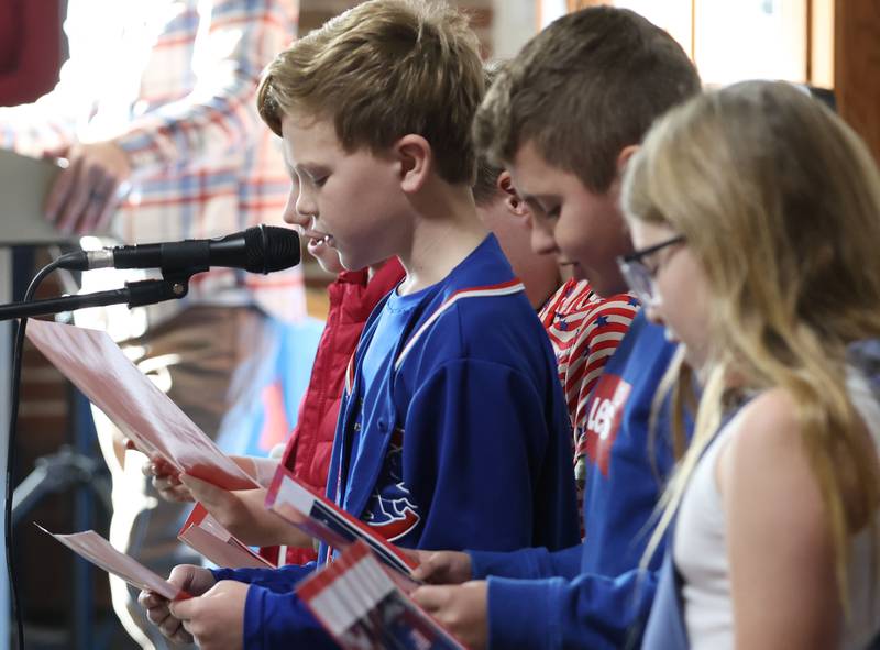 Students read a poem during the Veterans Day program at Lincoln School on Tuesday, Nov. 11, 2025 in Princeton.