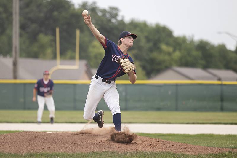 Bryce Rosenow of the Whiteside Wildcats semi-pro team fires a pitch against Palmer Wednesday, July 19, 2023.