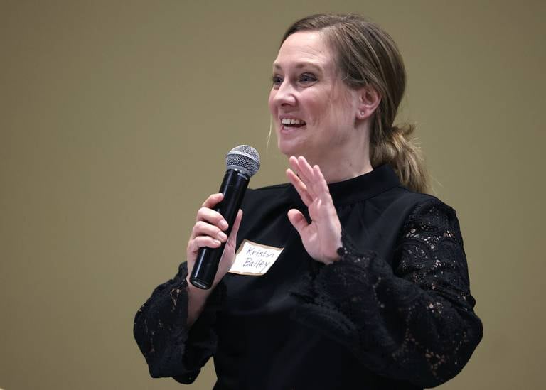 District 428 School Board candidate Kristin Bailey speaks Thursday, March 20, 2025, during the DeKalb Area Rental Association and DeKalb Area Builders Association School Board Candidates Forum at Faranda's Banquets in DeKalb.