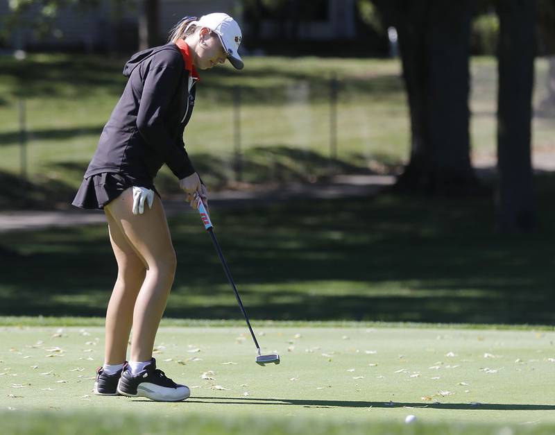 Crystal Lake Co-op’s Delaney Medlyn puts on ninth green during the IHSA Class 2A Huntley Girls Golf Regional on Tuesday, Oct. 1, 2024, at Pinecrest Golf Club in Huntley.