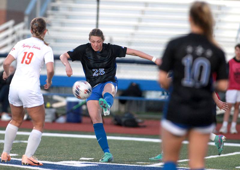 St. Charles North’s Kaitlin Glenn kicks the ball during a Tri-Cities Night game against St. Charles East at St. Charles North in April 2024.