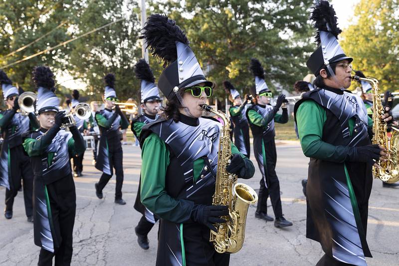 The Rock Falls marching band leads the homecoming parade Thursday, October 10, 2024, down Fifth Street.