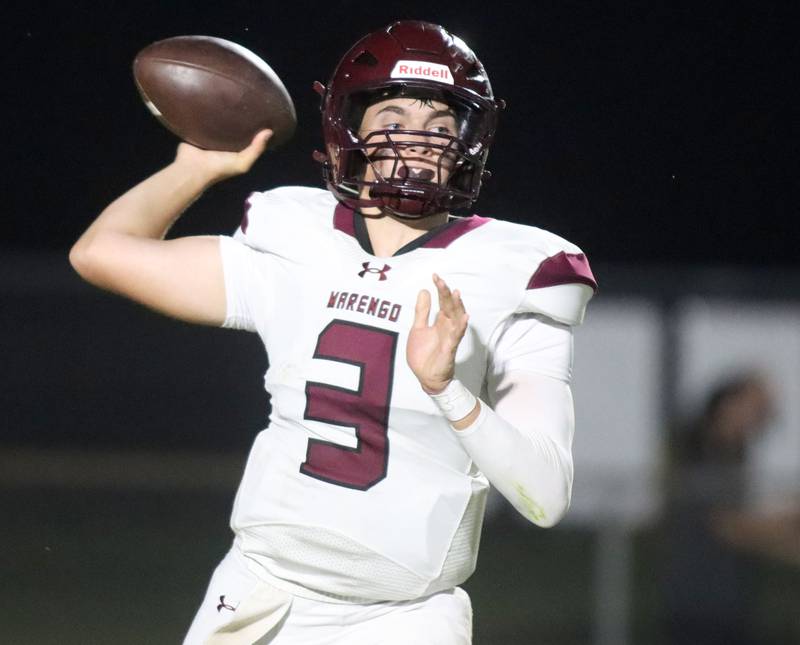 Marengo’s Sam Vandello fires a pass against Woodstock North in varsity football at Rod Poppe Field on the campus of Marengo High School in Marengo on Friday, Sept. 12, 2025.