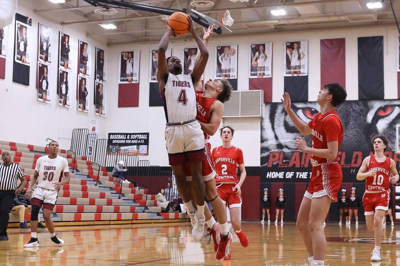 Plainfield North’s Amari Evans draws the foul taking a shot against Naperville Central on Wednesday, Jan 22, 2025 in Plainfield.