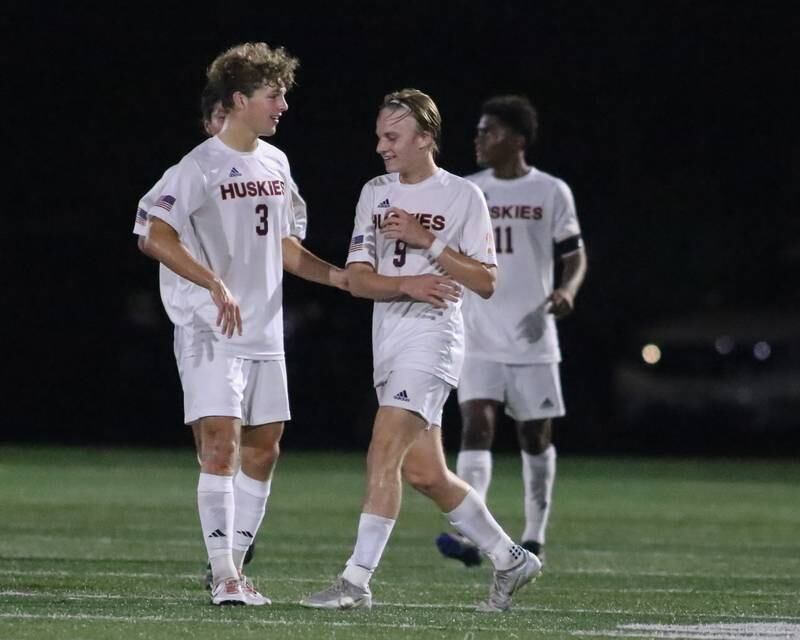 Naperville North's Josh Pedersen (9) celebrates a goal with teammates during soccer match between Naperville North at Morton.  Sept 21, 2023.