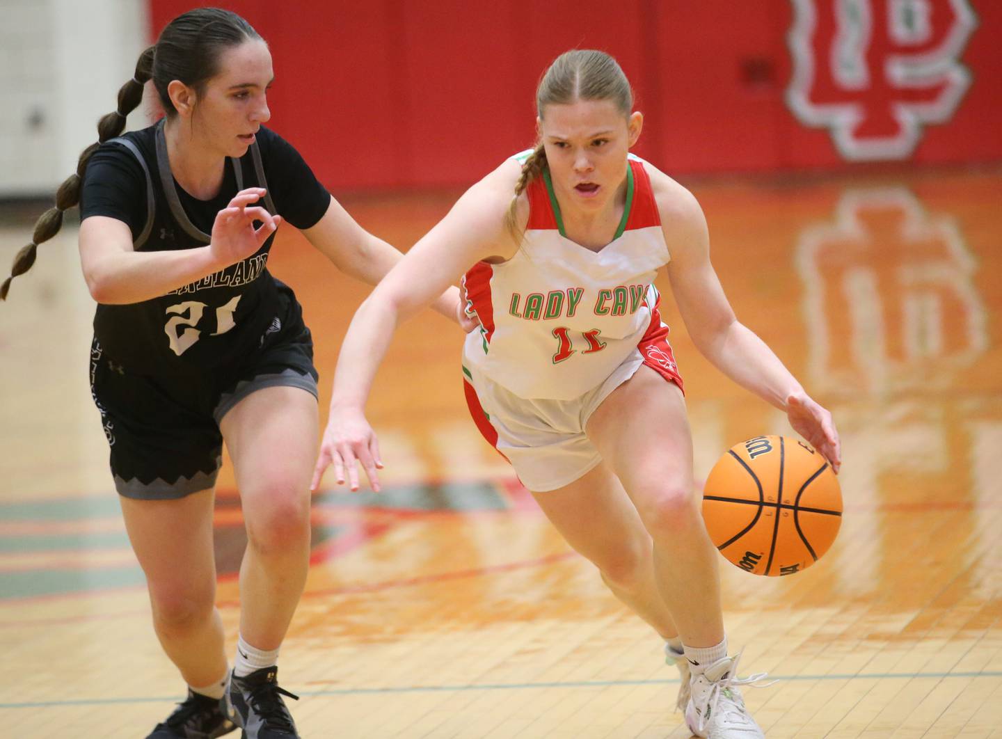 L-P's Elizabeth Sines drives down the court as Kaneland's Kyra Lilly defends on Wednesday, Jan. 15, 2025 in Sellett Gymnasium at L-P High School.