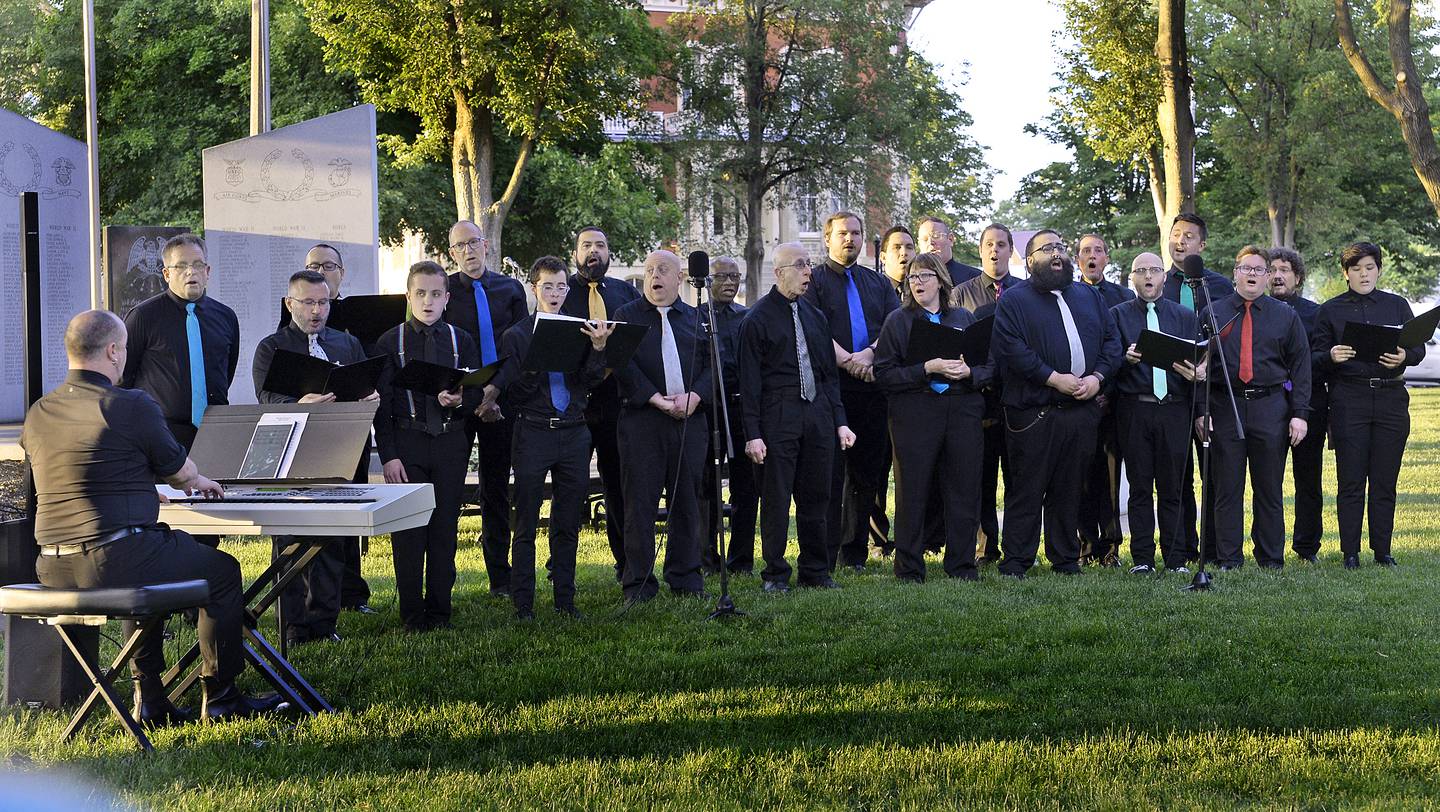 A contingent of the Chicago Gay Men’s Chorus performs Friday, June 9, 2023, during a Pride Night of Remembrance event at Washington Square in Ottawa.