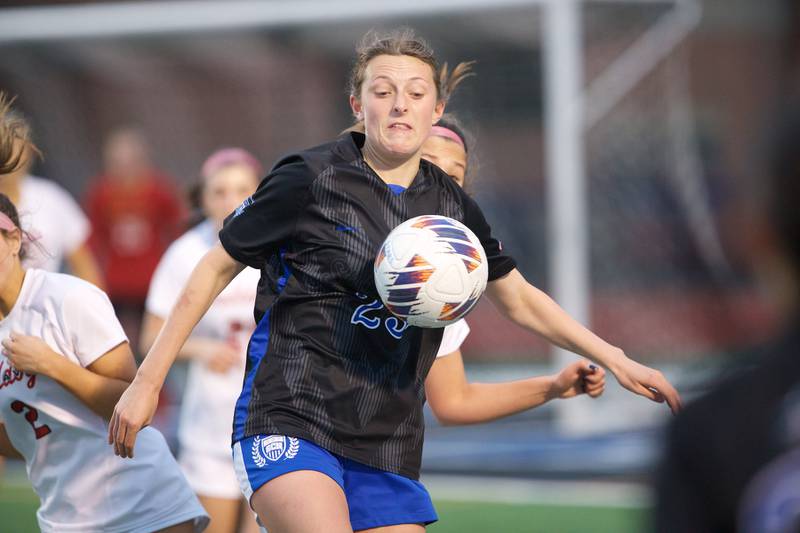 St. Charles North's Kaitlin Glenn keeps the ball against Batavia on Thursday April 11, 2024 in St. Charles.