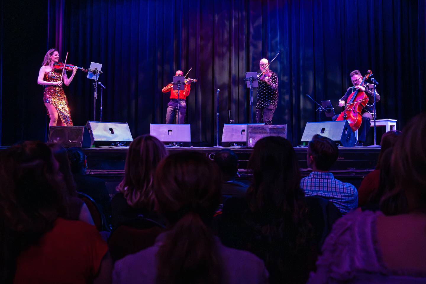 The Vitamin String Quartet performs during the reopening of the Rialto Square Theatre in Joliet, Ill. on Tuesday Oct. 22, 2024