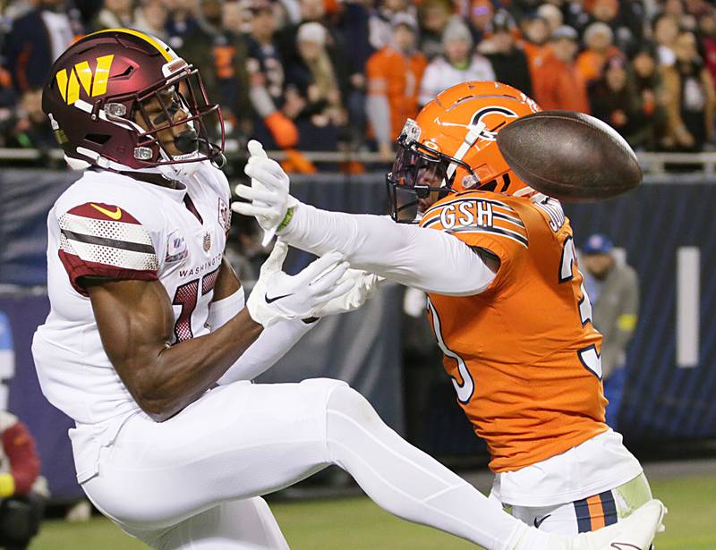 Chicago Bears defensive back Jaylon Johnson (33) blocks a pass intended for Washington Commanders Terry McLaurin (17) on Thursday, Oct. 13, 2022 at Soldier Field.