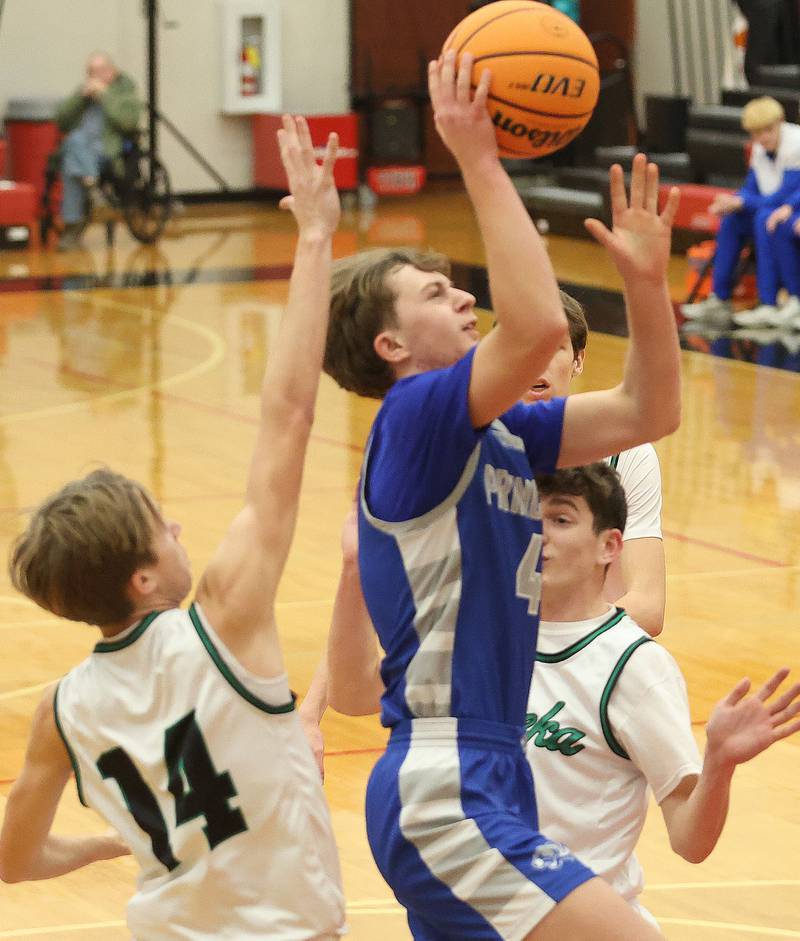 Princeton's Julian Mucha runs in for a layup against Eureka's Gavin Stalter during the Colmone Classic on Thursday, Dec. 11, 2025 at Hall High School.