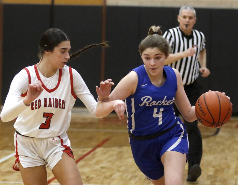 Burlington Central's Emersyn Fry brings the ball up the court against Huntley's Cassidy Serpe during a Fox Valley Conference girls basketball game Friday, Feb.2, 2024, at Huntley High School.