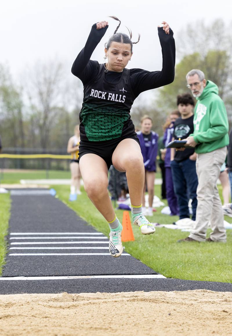 Rock Falls’ Ashlyn Fargher looks to land her triple jump Friday, April 25, 2025, during the Rock Falls Rocket Invite.