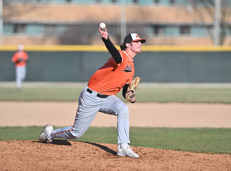 Minooka's Ryan Anderson throws a pitch during the non-conference game against Joliet Catholic on Monday, March. 11, 2024, at Joliet.