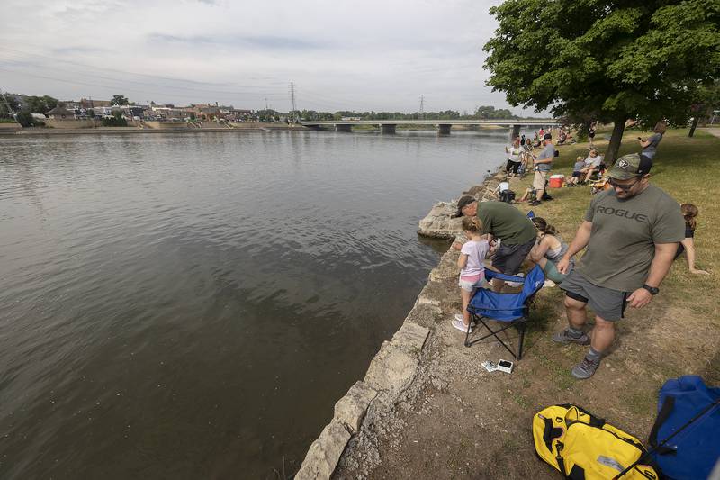 Over 50 kids signed up to participate in the Elk’s Club Fishing Derby Saturday, July 1, 2023 as part of Petunia Fest in Dixon. The anglers were lined up on the north side of the Rock River between the bridges to compete for trophies, fishing tackle and a new pole.