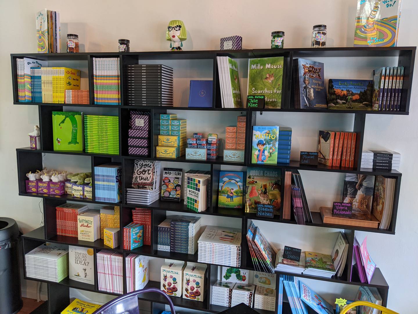 The Scoop also sells books, half of them written by local authors. The store plans to do author readings starting in the fall.