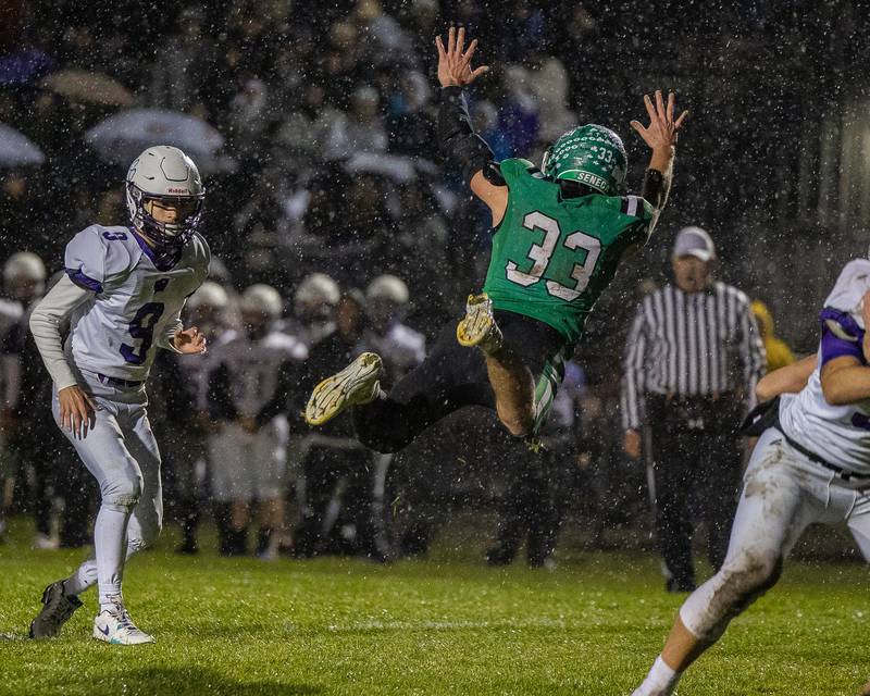 Cam Shriey (33) of Seneca leaps in attempt to deflect field goal kick on Saturday, November 8, 2025 at Seneca High School in Seneca.