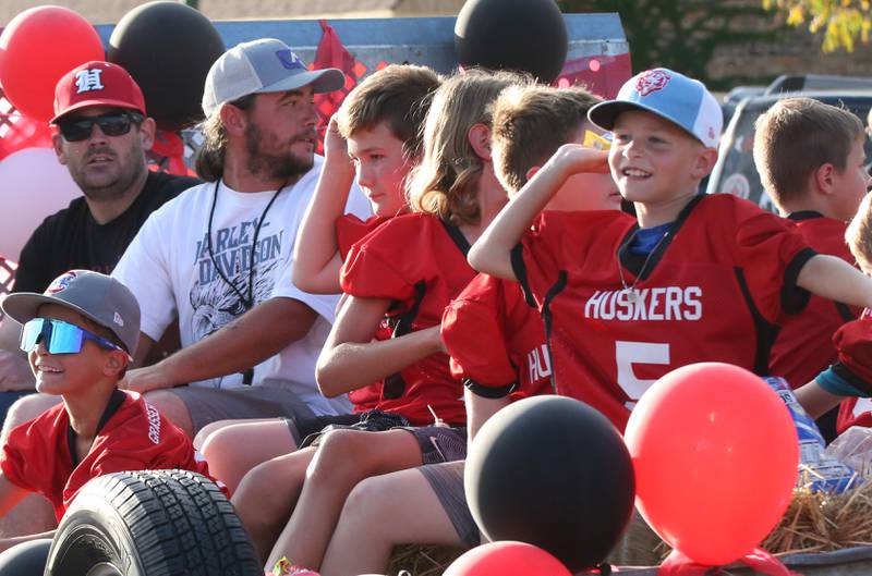 Spring Valley flag football players ride a float during the Hall High School Homecoming parade on Thursday, Sept. 28, 2023 in Spring Valley.