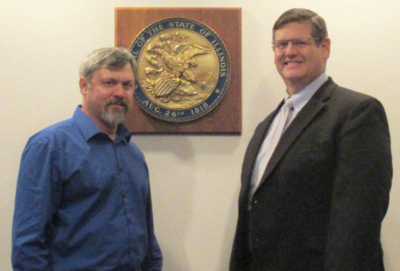 Sandwich Mayor Todd Latham (left) and new city administrator Geoff Panman (right) after his appointment at an Oct. 17 2022 city council meeting at City Hall.